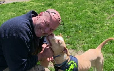 Hounds Town CEO smiling as a tan