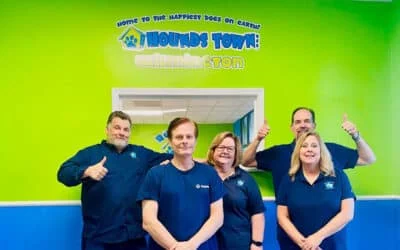Five Hounds Town franchise owners smiling in