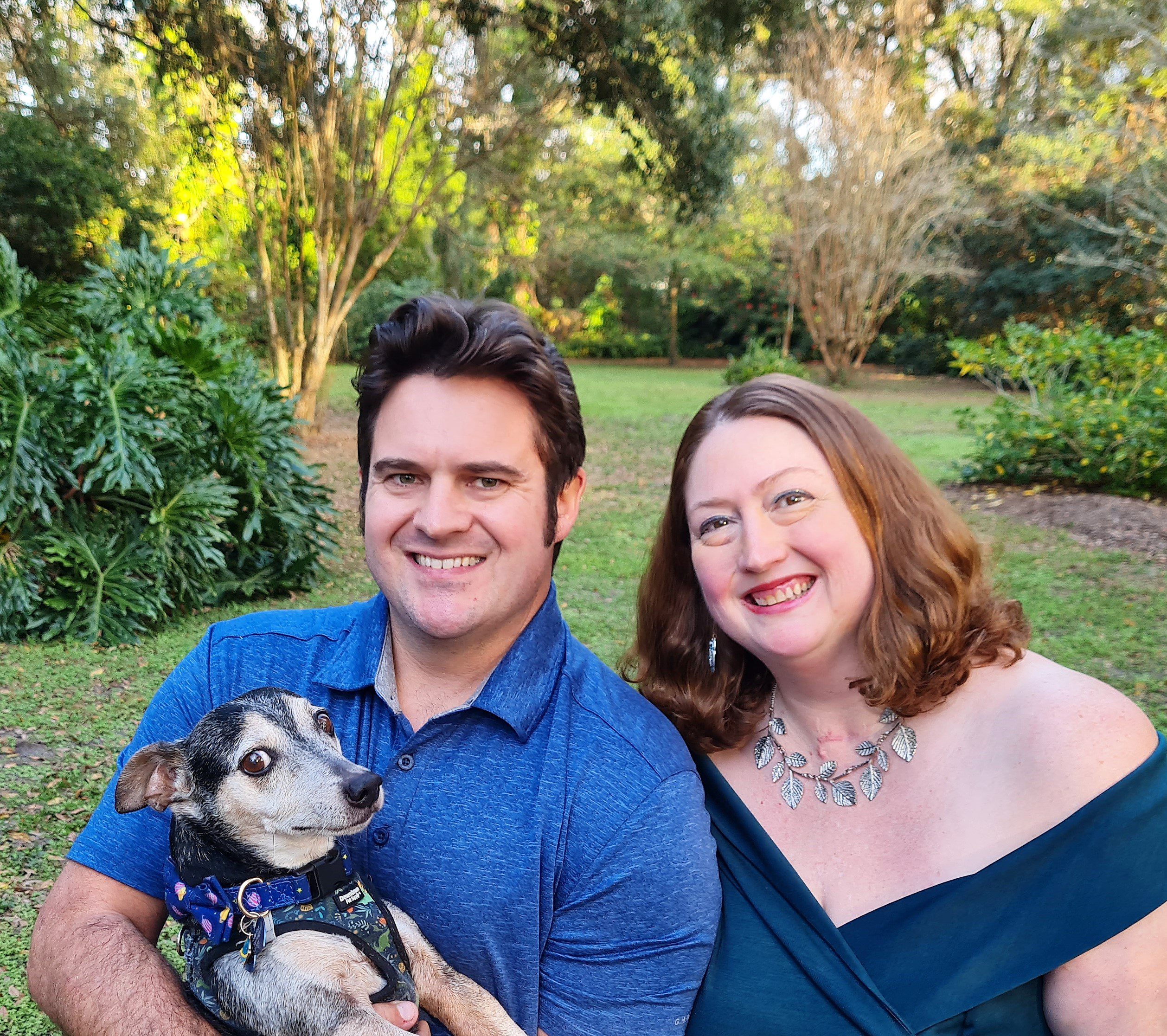 Orlando pet care Franchise Owners Chris and Caitlin LaBianco with fur baby Loki