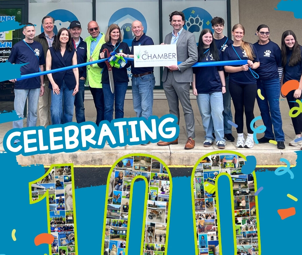 Hounds Town team celebrating the opening of the brand's 100th location